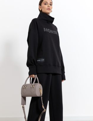 MONSTA black tracksuit woman